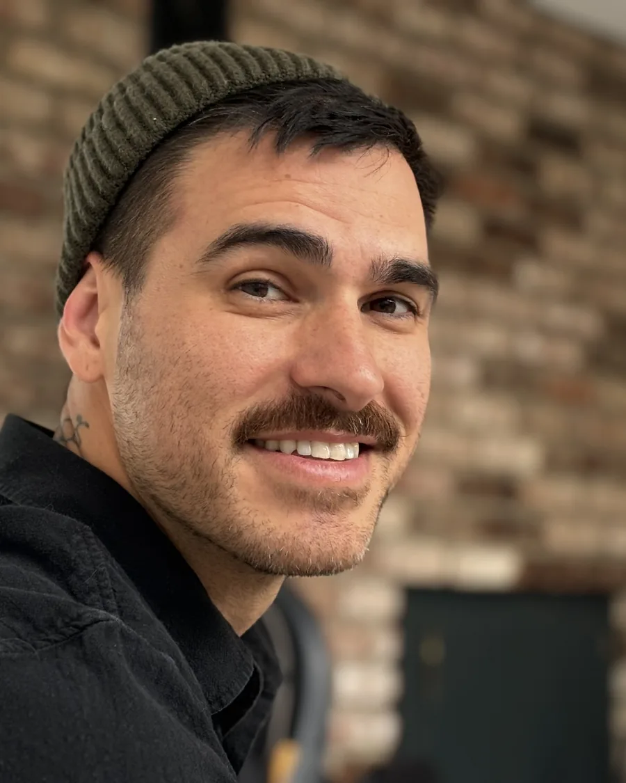 Cassius, the chemistry professor who makes Pocket Professor, smiling